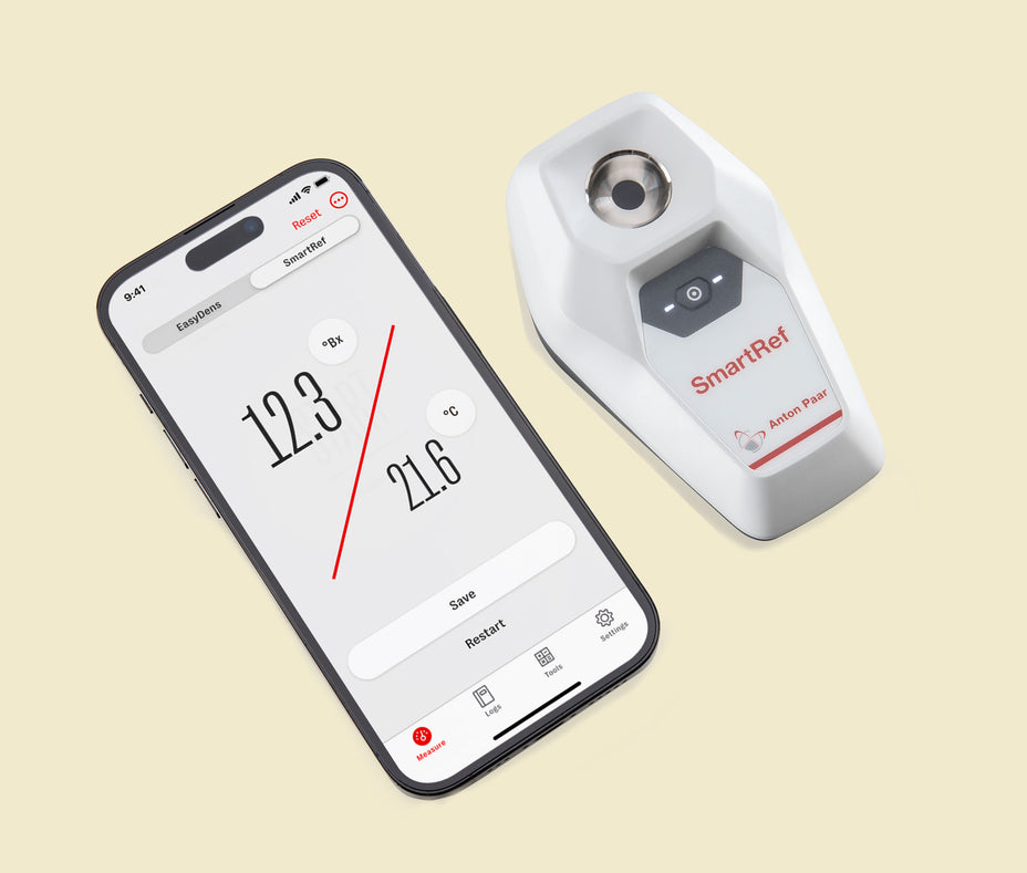SmartRef device and Lab Meister app on a beige background